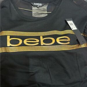 Bebe Black Tee with Gold Stripes